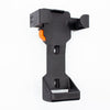 Black and orange tool holder on a white background