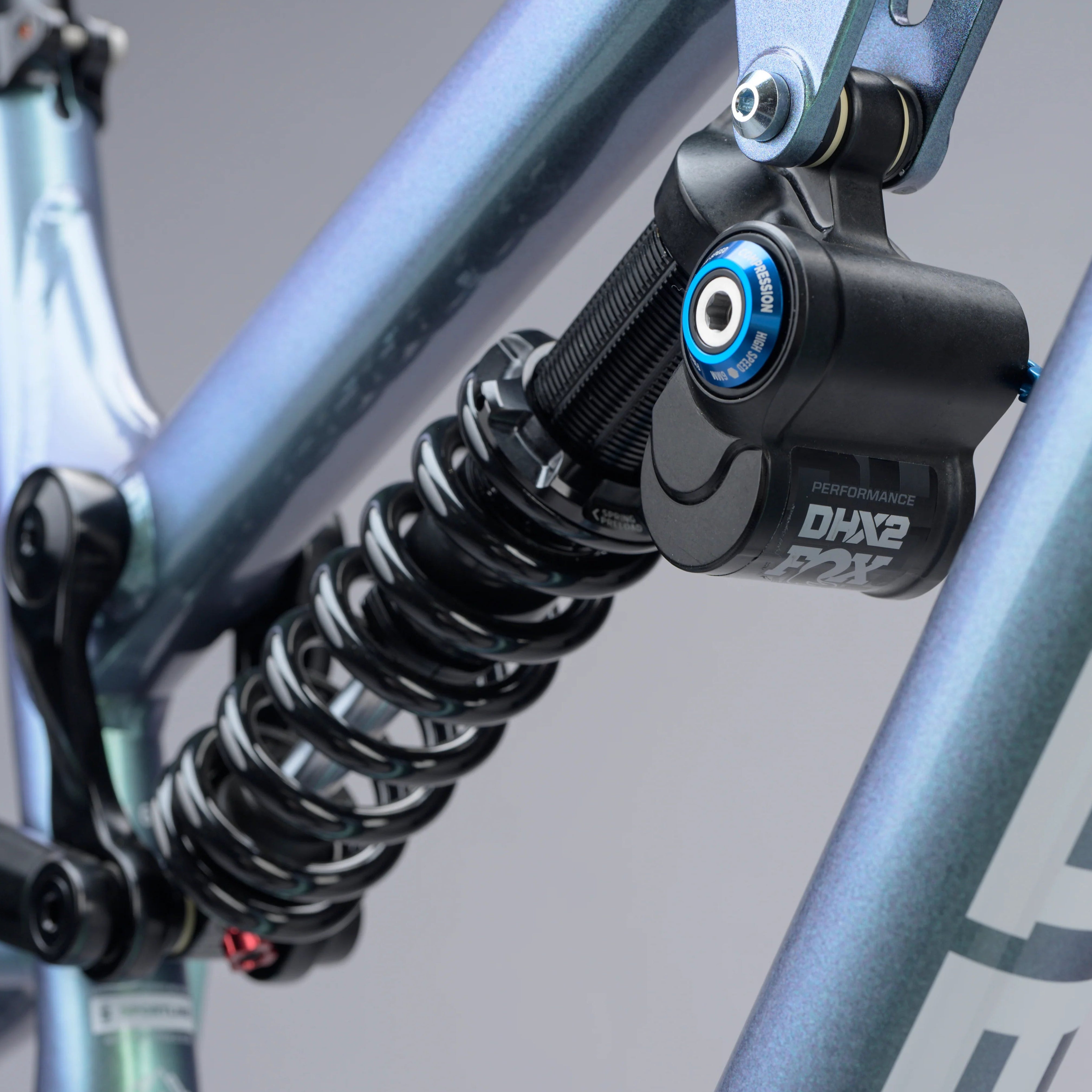Close-up of a bicycle suspension fork with a blurred background