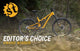 Yellow mountain bike on a forest trail with 'ST' logo and 'Editor's Choice Award Winner' text.