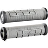 Two gray bicycle grips with textured surface on a white background